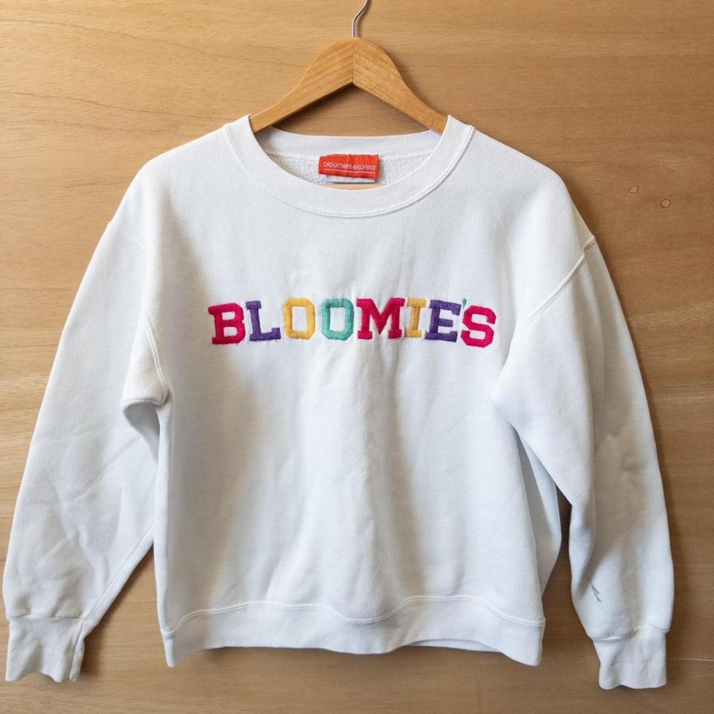 White Bloomingdale's crewneck sweatshirt with "Bloomies" embroidery